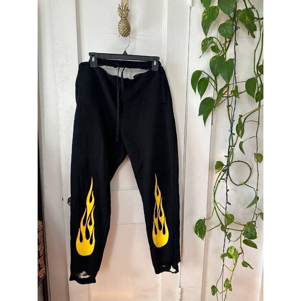 Fashion Nova women’s size large fire pants *damage